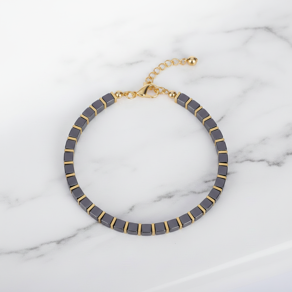 Black Gold Tila Bracelet Flat Lay on Marble
