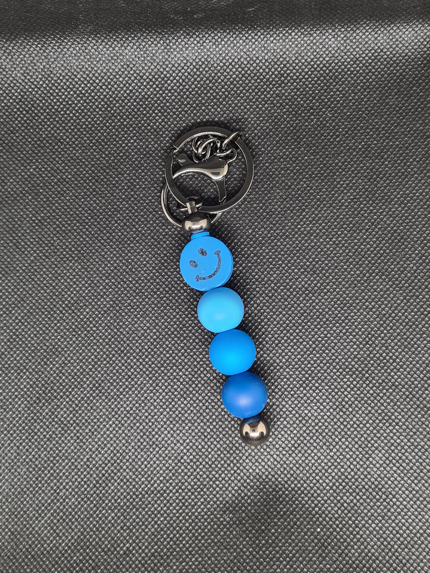 Smiley Face Key Chain, Black/Silver with Tassel