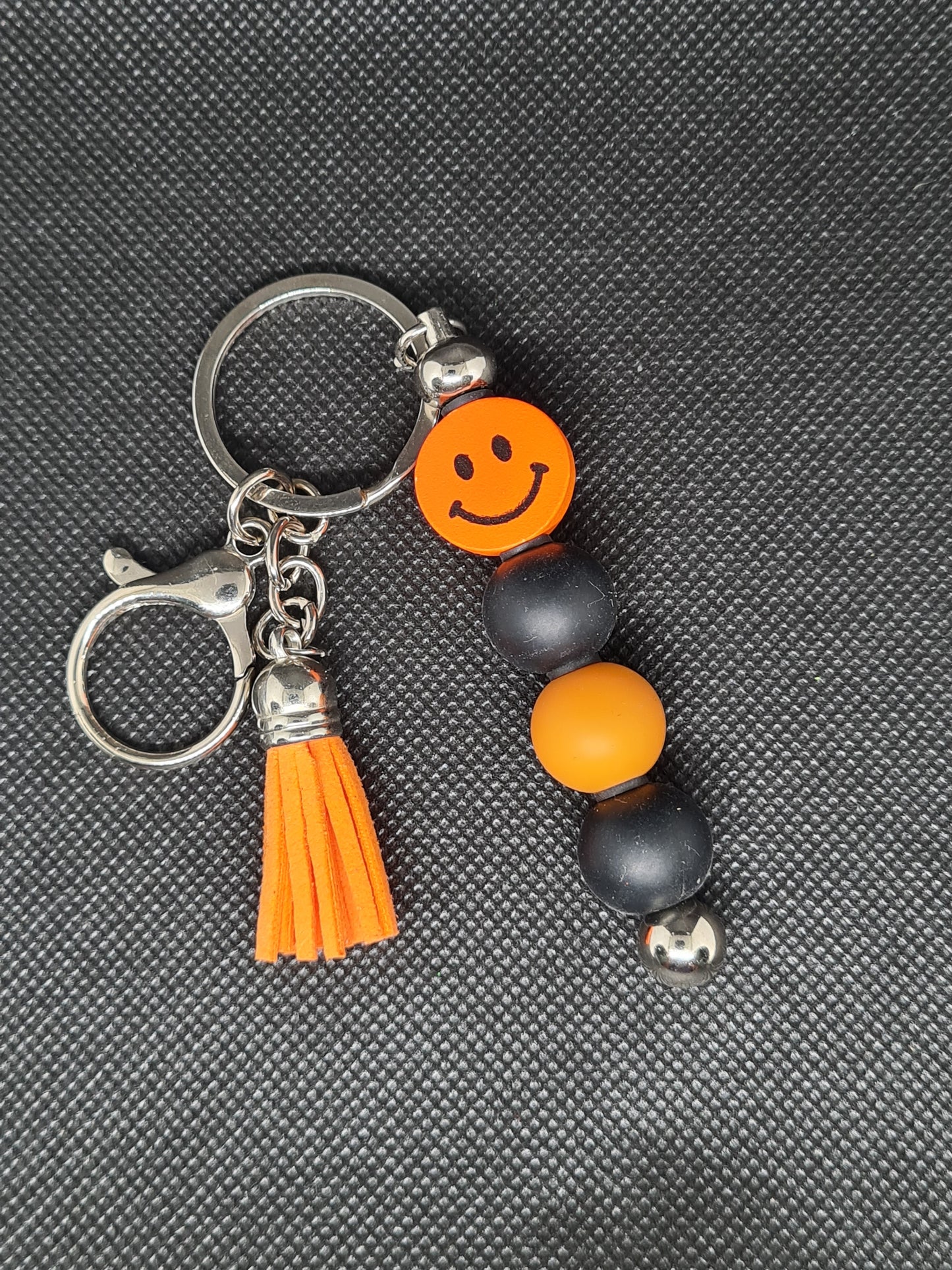 Smiley Face Key Chain, Black/Silver with Tassel