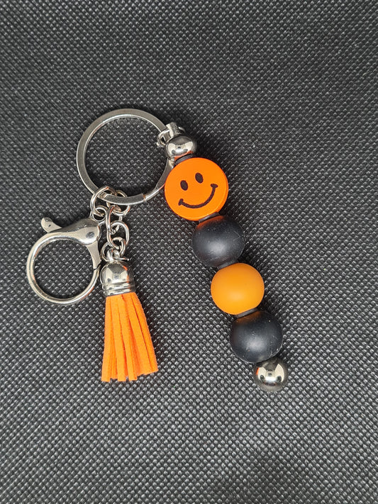 Smiley Face Key Chain, Black/Silver with Tassel