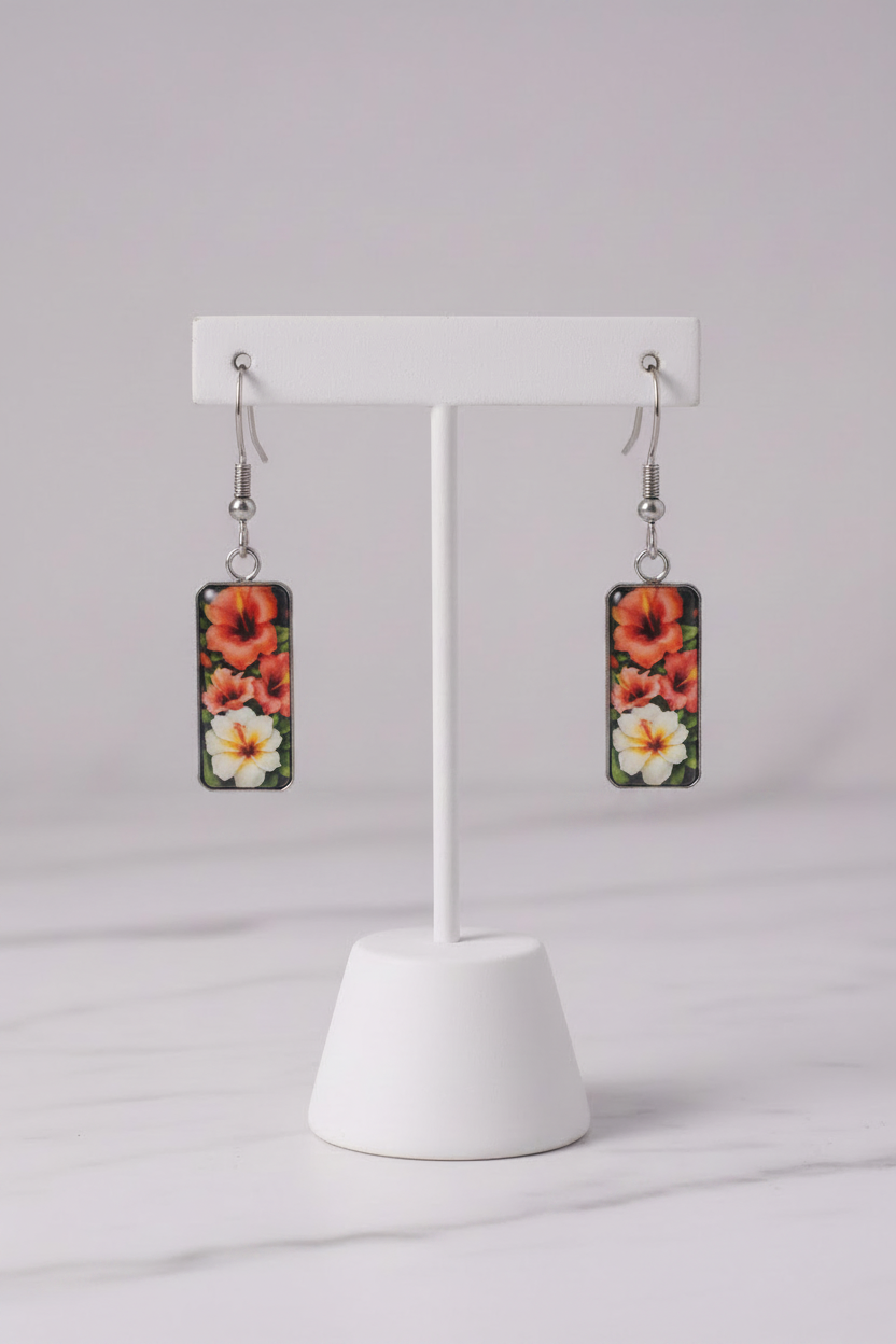 Aqua floral earrings on white porcelain stand
