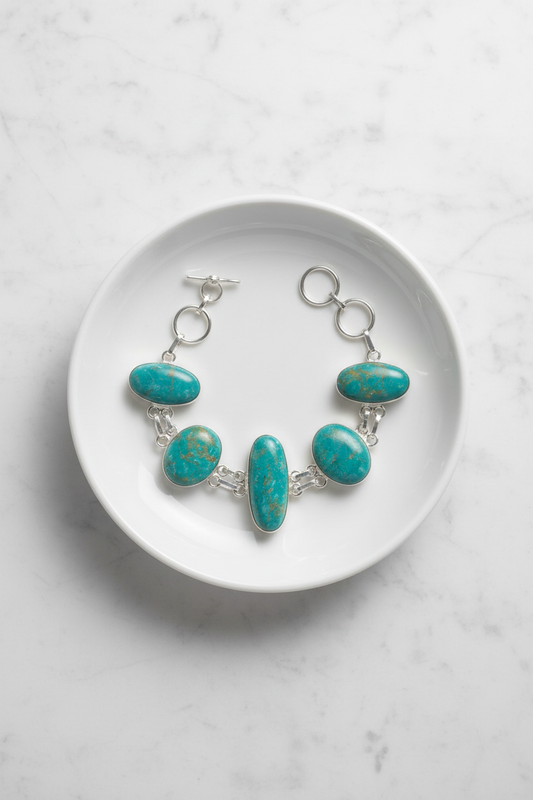 Five-stone turquoise bracelet flat lay