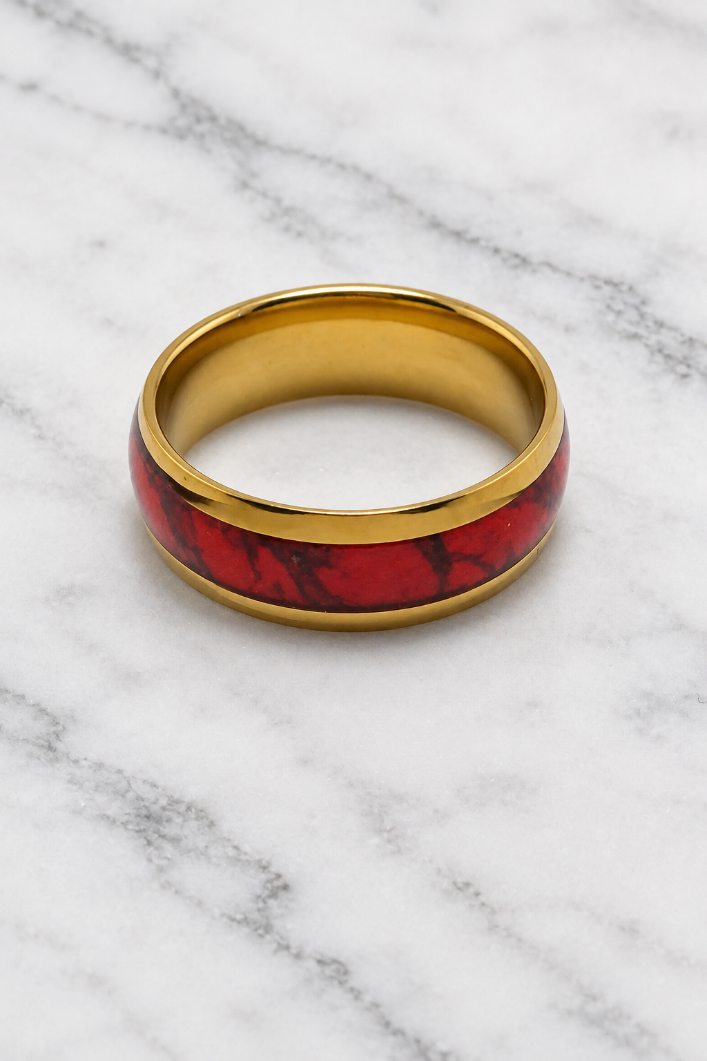 Gold red inlay ring flat lay on white marble2