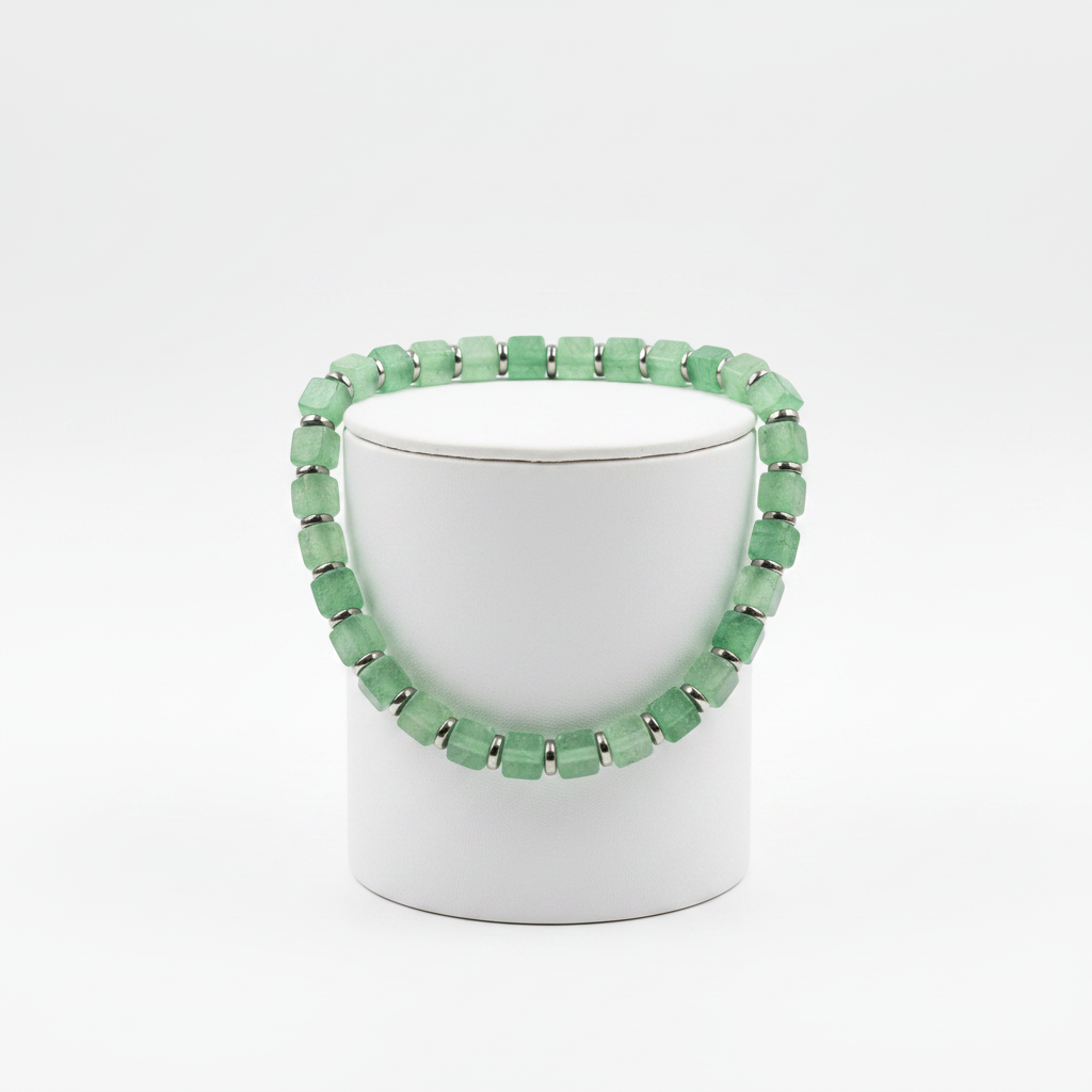 Green Bracelet on Cylindrical Stand