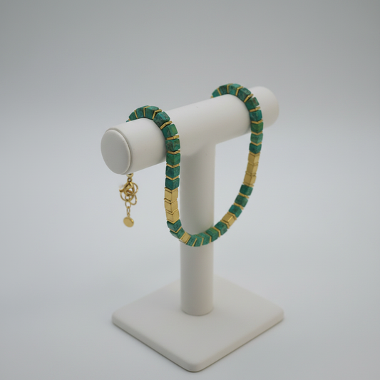 Green bracelet on T-style ceramic stand