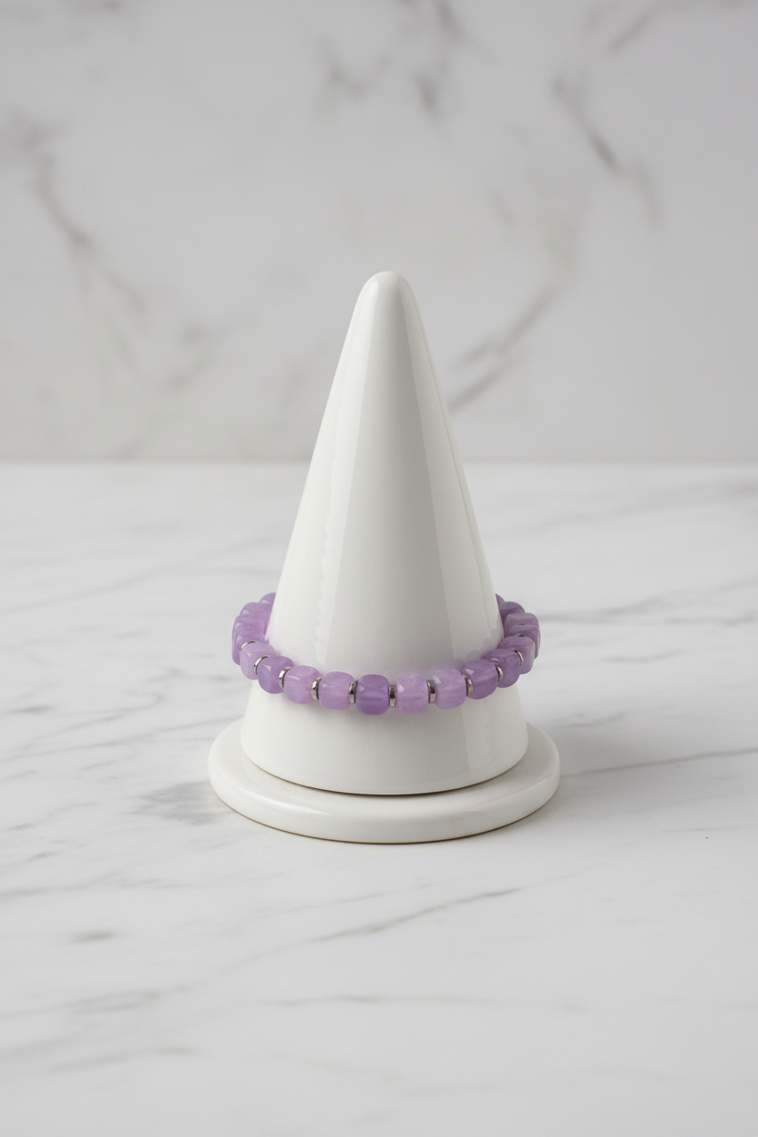 Lilac cube bead bracelet on white porcelain cone
