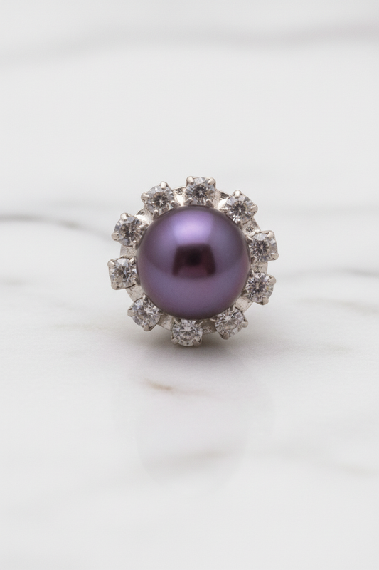 Macro of purple pearl floral cluster stud