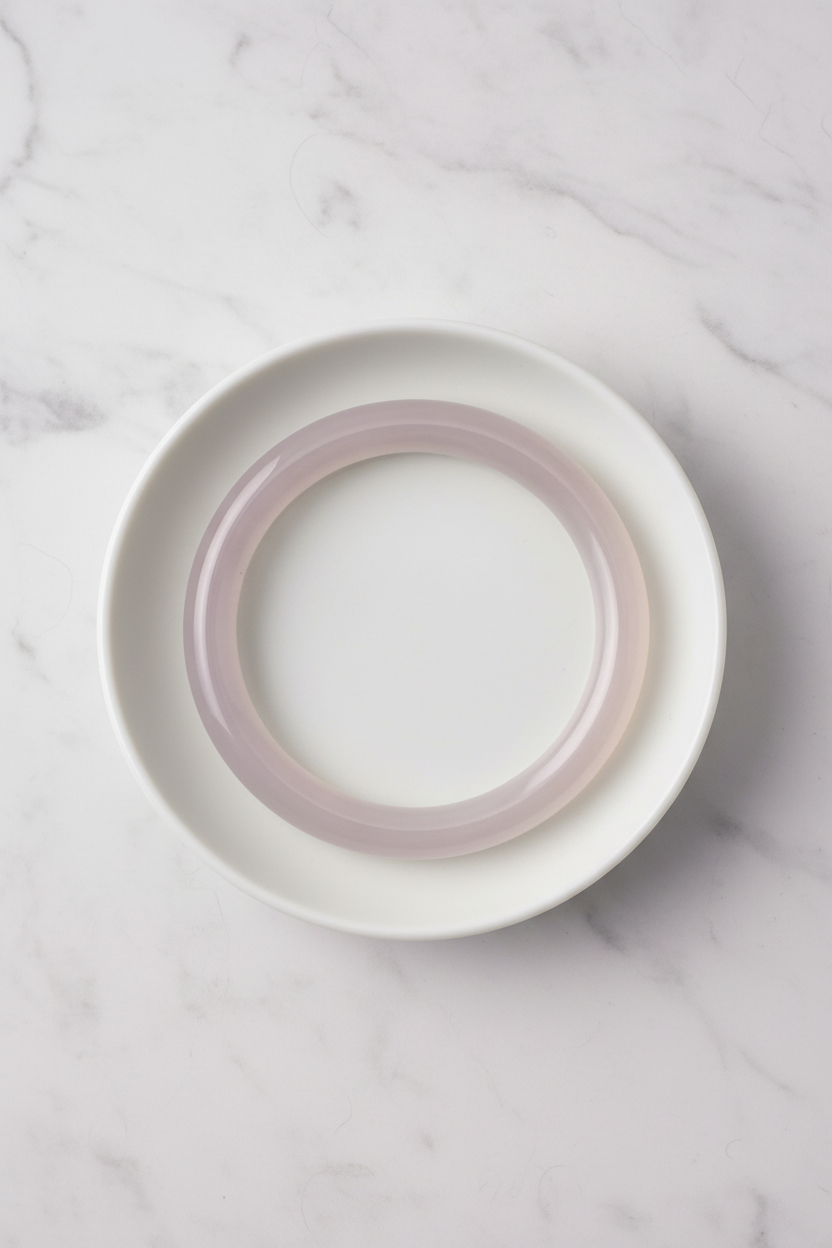 Translucent smoky-lilac bangle flat lay